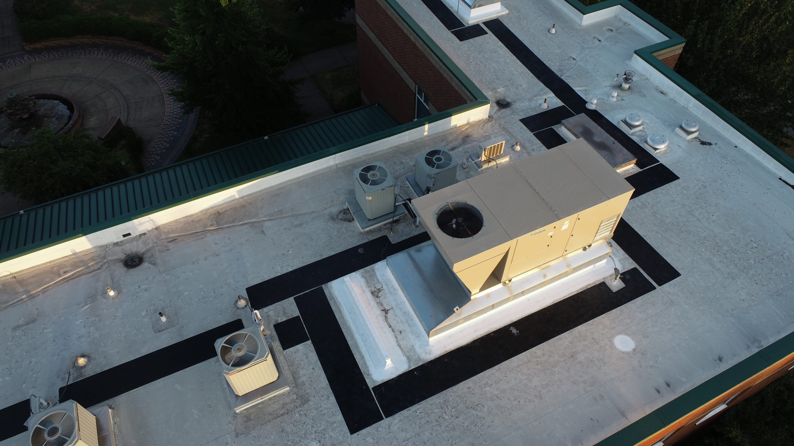 Aerial view of a rooftop HVAC installation on a commercial building